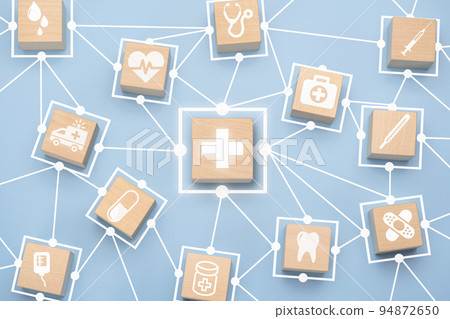 Health care and medical icons on wooden block with connection link for healthy wellness insurance and assurance concept 94872650
