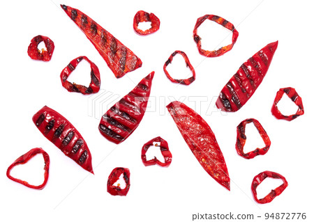 Grilled Slices of red pepper with stripes from a grill isolated on white background Grilled Slices of red pepper with stripes from a grill isolated on white background 94872776