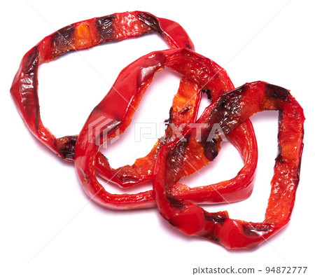 Grilled Slices of red pepper with stripes from a grill isolated on white background Grilled Slices of red pepper with stripes from a grill isolated on white background 94872777