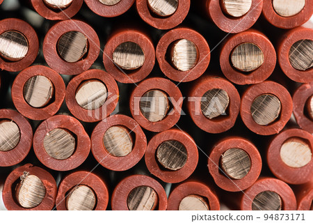 Electrical copper wire cross section as background Electrical copper wire cross section as background 94873171