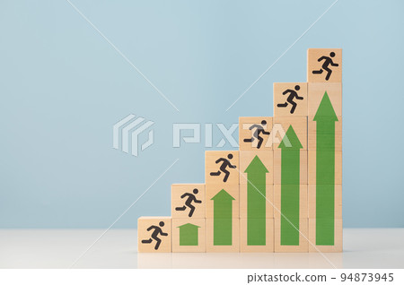 ladder of success. Business Success. man running up to stair. up arrows showing growth and silhouette of man on wooden cubes. copy space 94873945