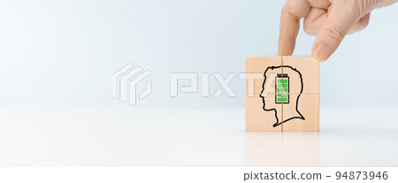 Supporting mental health at work concept. Motivation, professional, productivity, enthusiasm. Fully charged active mentally healthy employees. Happy and active working. wooden cubes 94873946