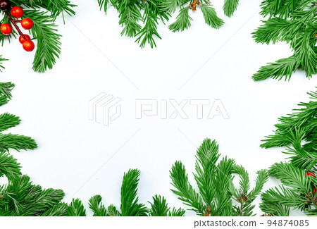Merry Christmas and happy New year. Mockup with postcard and branches of Christmas tree on white background with copy space. Top view. Christmas background. 94874085