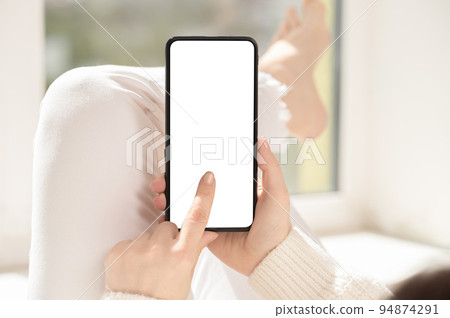 Cellphone mockup. woman user customer hold cellphone mockup with white screen in hand. Use mobile shopping app, check social media news, texting mobile sms order food delivery Cellphone mockup. woman user customer hold cellphone mockup with white screen in hand. Use mobile shopping app, check social media news, texting mobile sms order food delivery 94874291