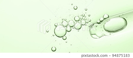 The texture of a facial serum or cosmetic gel. Close-up, macro photography The texture of a facial serum or cosmetic gel. Close-up, macro photography 94875183