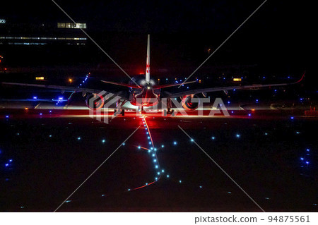 Airport at night Airplane taxiing Chitose City, Hokkaido Airport at night Airplane taxiing Chitose City, Hokkaido 94875561