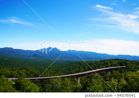 Mikuni Pass <Matsumi Ohashi> in early autumn, Hokkaido 94876041