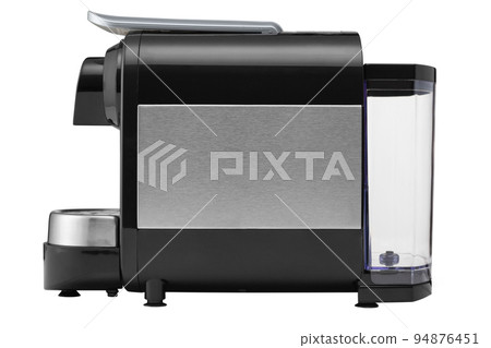 Black electric coffee machine with silver inserts, for making coffee from capsules, side view, isolate 94876451