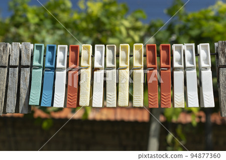 Wash-line in open space under the blue sky 94877360