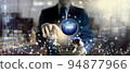 Convenience of world class communication technology by young business man using smartphones. 94877966