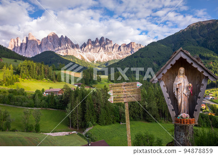 Chapel of St. Magdalena in Funes Valley, Dolomites alps in Northern Italy Chapel of St. Magdalena in Funes Valley, Dolomites alps in Northern Italy 94878859