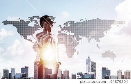 Concept of business success and control with confident boss against cityscape background Concept of business success and control with confident boss against cityscape background 94879204