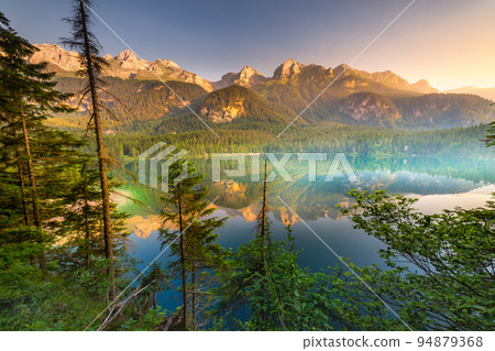 Above Lake Tovel reflection symmetry in Trentino-Alto Adige, Dolomites, Italy Above Lake Tovel reflection symmetry in Trentino-Alto Adige, Dolomites, Italy 94879368