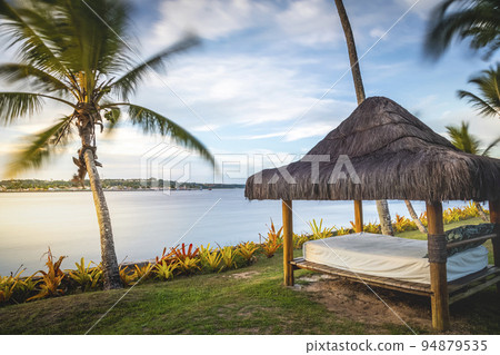 Porto Seguro Beach with tropical tregarden e and gazebo palapa in BAHIA, Brazil 94879535