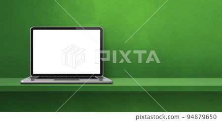 Laptop computer on green shelf background banner 94879650
