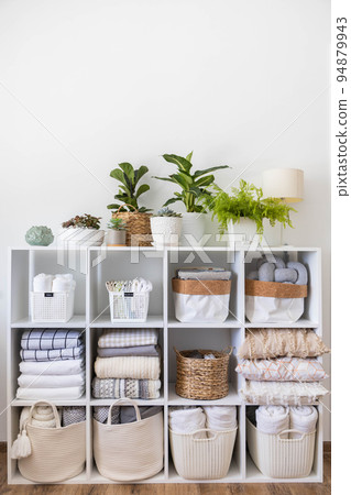 Domestic textile bed linen neatly placed cupboard shelves minimalism Nordic storage method Domestic textile bed linen neatly placed cupboard shelves minimalism Nordic storage method 94879943