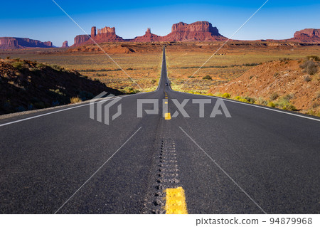 Highway Road U.S. Highway 163 and Monument Valley at sunset, Arizona, USA 94879968