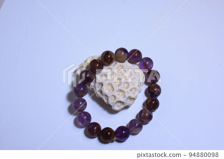 Garden amethyst and coral power stone background Garden amethyst and coral power stone background 94880098