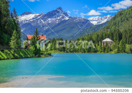 Alleghe lake and village in the idyllic italian Dolomites, Northern Italy Alleghe lake and village in the idyllic italian Dolomites, Northern Italy 94880206