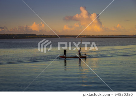 Fishing in Porto Seguro Beach at sunset in Trancoso, BAHIA 94880380
