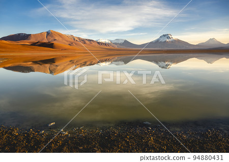 Idyllic Lake Lejia reflection and volcanic landscape in Atacama desert, Chile 94880431