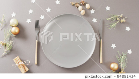 Image of christmas place setting with cutlery on grey background Image of christmas place setting with cutlery on grey background 94881434