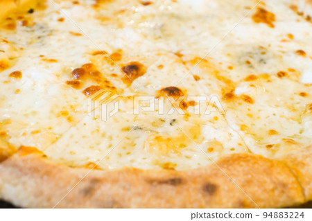 Sliced italian pizza with cheese Sliced italian pizza with cheese 94883224