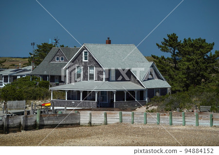 panorama of Sandy Neck Lighthouse atlantic ocean cape cod barnstable houses taken from the sea 94884152