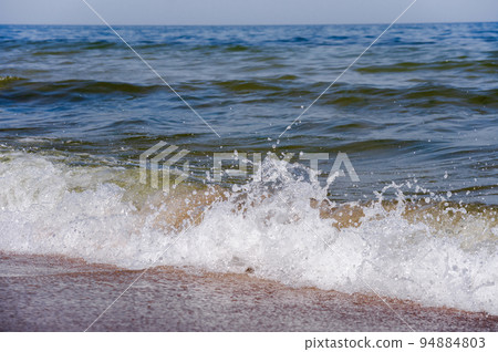 Tides and storms at sea. Seacoast. Waves on the Baltic Sea. Tides and storms at sea. Seacoast. Waves on the Baltic Sea. 94884803