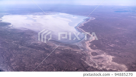 Aerial Panorama view to saline Barsa Kelmes lake and Ustyurt plateau at Karakalpakstan, Uzbekistan Aerial Panorama view to saline Barsa Kelmes lake and Ustyurt plateau at Karakalpakstan, Uzbekistan 94885270