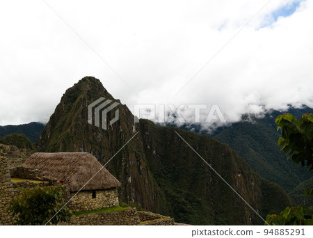 Aerial Panoramic view to Machu Picchu archaeological site and Huayna Picchu mountain , Cuzco, Peru 94885291