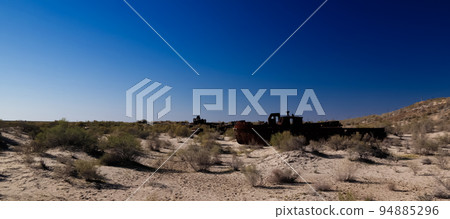 Panorama of ship cemetery near Moynaq at sunrise, Karakalpakstan, Uzbekistan 94885296