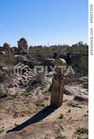 Tomb stone aka Kulpytas at the cemetery of Mizdakhan, Khodjeyli,Karakalpakstan, Uzbekistan Tomb stone aka Kulpytas at the cemetery of Mizdakhan, Khodjeyli,Karakalpakstan, Uzbekistan 94885309