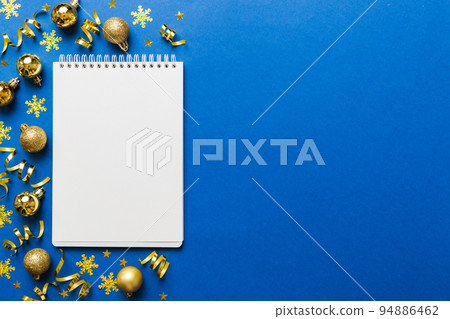 Christmas blank greeting card mock-up scene. Creative layout made of Christmas tree branches and paper card note. Flat lay. Nature New Year concept Christmas blank greeting card mock-up scene. Creative layout made of Christmas tree branches and paper card note. Flat lay. Nature New Year concept 94886462