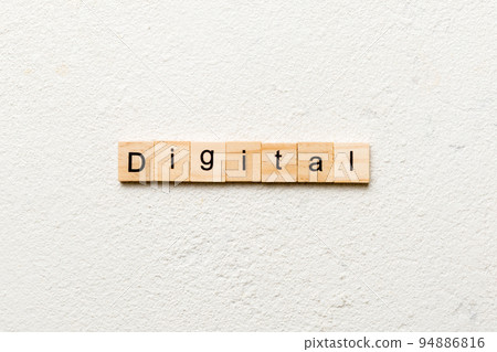 DIGITAL word written on wood block. DIGITAL text on cement table for your desing, concept DIGITAL word written on wood block. DIGITAL text on cement table for your desing, concept 94886816