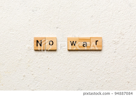 No war word written on wood block. No war text on table, concept 94887084
