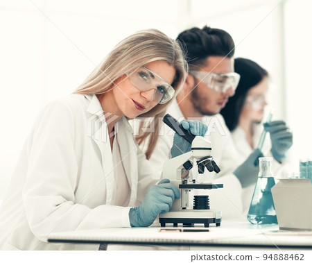 close up.female scientist working in a modern laboratory close up.female scientist working in a modern laboratory 94888462