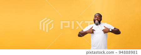 Young african american man over isolated background looking confident with smile on face, pointing oneself with fingers proud and happy 94888981