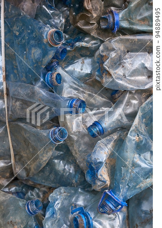 Plastic bottles in bales for waste recycling 94889495