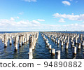 Princes Pier in Melbourne Australia; the historical wooden pylons; blue sky on the background 94890882