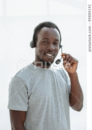close up. a handsome young man with a headset. close up. a handsome young man with a headset. 94894141