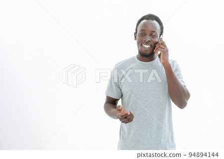 serious young man talking on his smartphone. 94894144