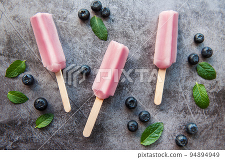 Homemade blueberry ice cream or popsicles 94894949