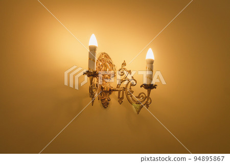 Decorative vintage wall sconce lamp candle with warm light 94895867