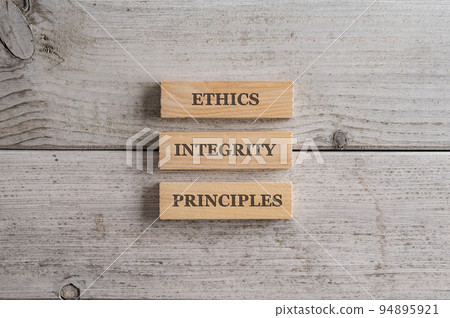 Words Ethics, Integrity and Principles written on three stacked wooden blocks Words Ethics, Integrity and Principles written on three stacked wooden blocks 94895921