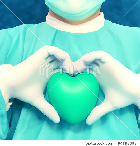 Surgeon holding a green hearth 94896095
