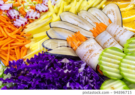Fresh various grated vegetables as salad ingredients top view. Healthy eating concept. Fresh various grated vegetables as salad ingredients top view. Healthy eating concept. 94896715