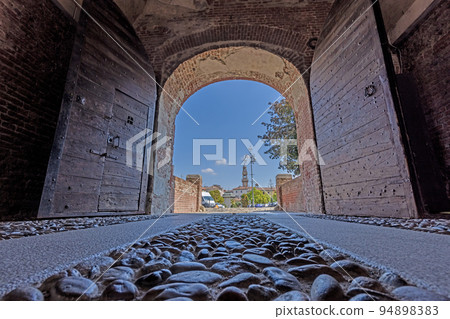 View through the entrance gate of the Castello del Monferrato 94898383