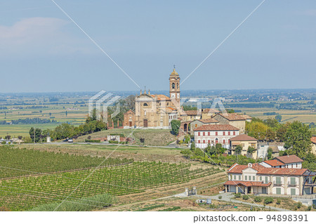 View of the village church of Camino in the Italian province of Piedmont View of the village church of Camino in the Italian province of Piedmont 94898391
