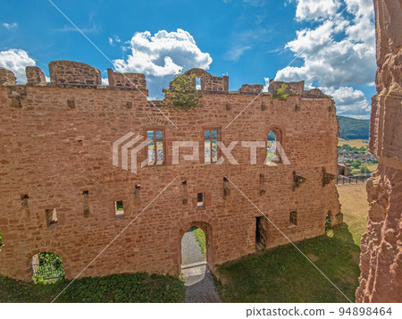 View of an old red brick wall of a historical castle 94898464
